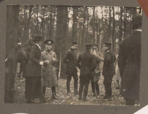 Equestrian scene at the Royal Game Preserve Het Loo: group of riders by a forest