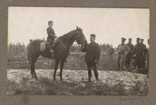 Equestrian scene at the Royal Hunting Lodge Het Loo: young rider on horseback, watched by uniformed men