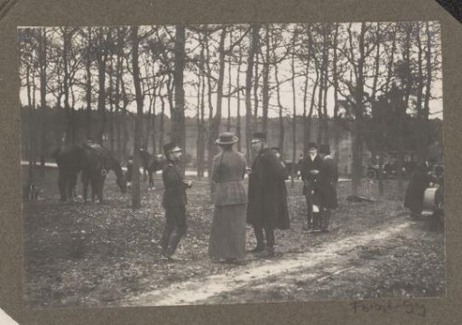 Equestrian scene at the Royal Forest Estate Het Loo: riders with public and cars in a forest