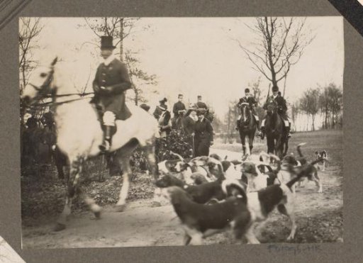 Equestrian scene at the Royal Forest Estate Het Loo: riders amidst a pack of hounds