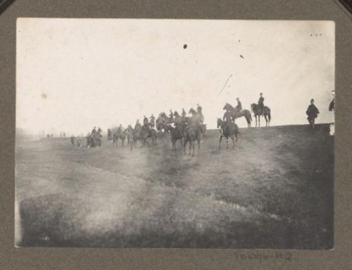 Equestrian scene at the Royal Forest Estate Het Loo: uniformed riders on rolling terrain