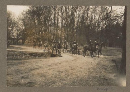 Equestrian scene at the Royal Hunting Lodge Het Loo: riders at a bridge on a country road