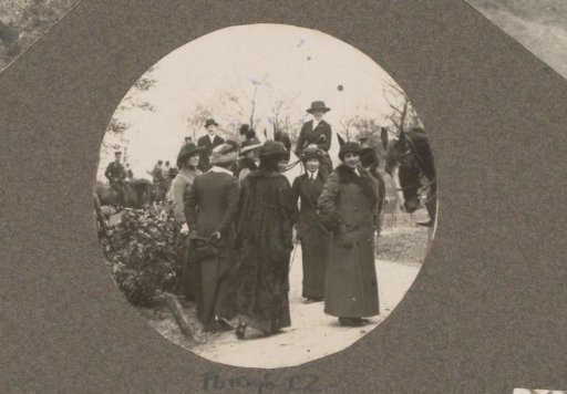 Equestrian scene at the Royal Forestry Het Loo: women in long coats near riders