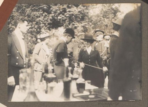 Equestrian scene at the Royal Gamekeeper's Lodge Het Loo: riders with spectators standing before a table with drinks