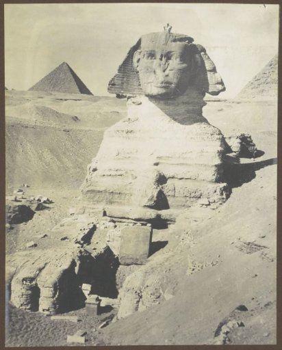 Sphinx of Giza with a man on top of it