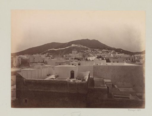 View of a town with roof terraces, possibly Tétouan