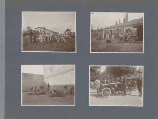 Civilian watches a soldier repair a car by a stable in France