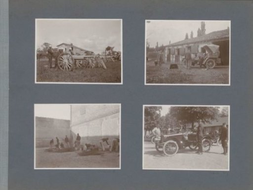 Soldiers cooking on wood fires in a courtyard in France