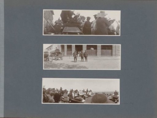Soldiers in a car near a haystack surrounded by women in France