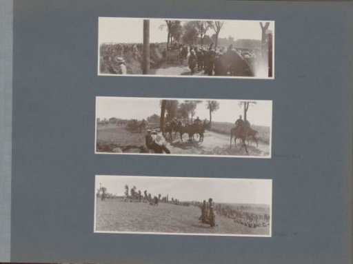 Mounted military column moving across field and road in France