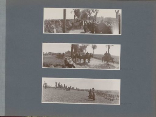 Soldiers resting on a hill with a cross in France