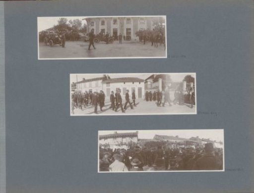Soldiers walking through a street in France
