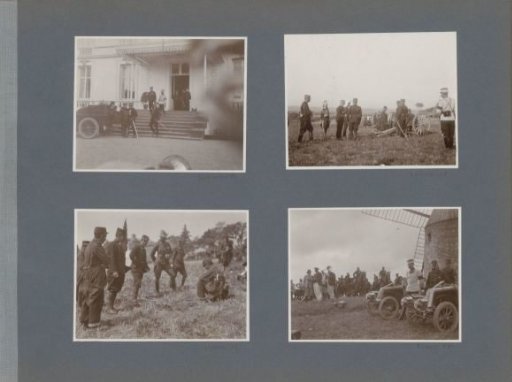 Soldiers looking at something in a field in France