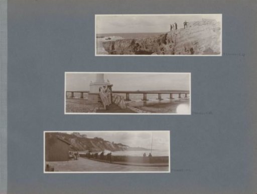 Group of men and women standing on rocks at the French coast