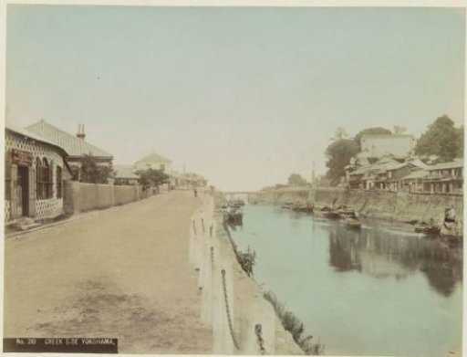 Quay on a waterway in Yokohama with the piano shop of JG Doering on the left