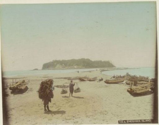 View of Enoshima with boats and bearers in the foreground