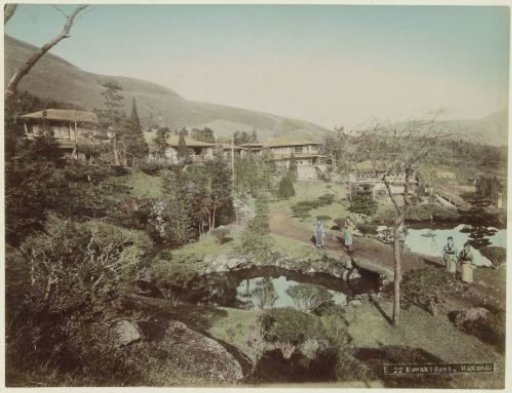 Women in a garden with ponds in Kowakidani