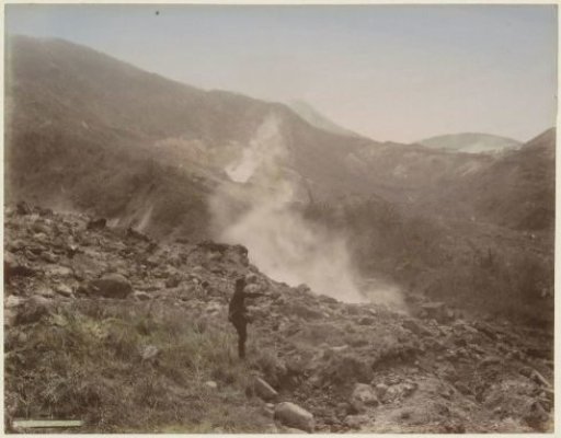 Man at a steaming crater in Owakudani