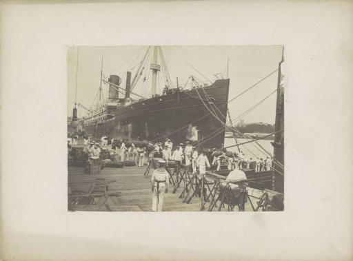 Quay in (probably) Sydney with steamship 'Darmstadt', marines, luggage and rifles