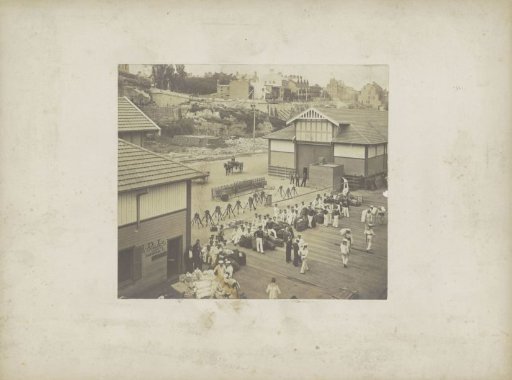 Quay in (probably) Sydney with marines, luggage, rifles and an office of N.D.L agents