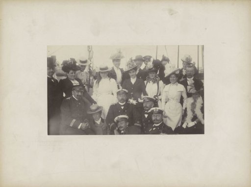 Group portrait of sailors with women, probably in Sydney