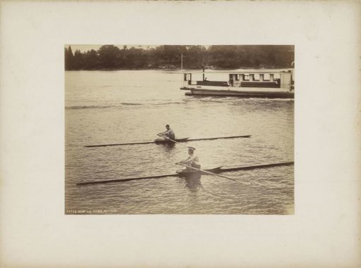Rowers Peter Kemp and Chris Neilson in action in a skiff, presumably in the waters of Sydney