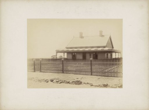 Wooden house with a yard and a fence, probably in Sydney