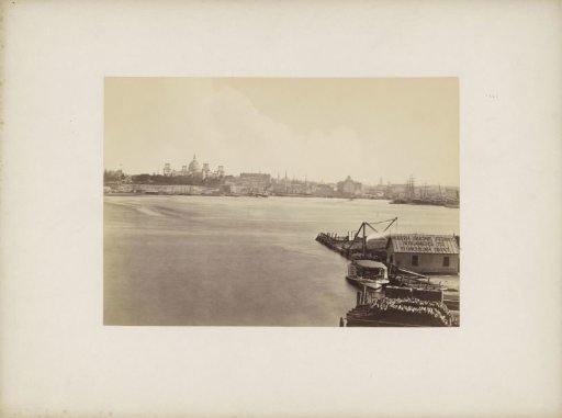 View of Sydney with harbour, ferry and on the horizon to the left the Garden Palace