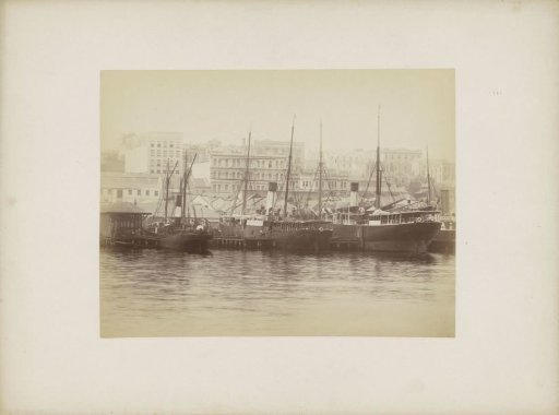Boats at the quay in the harbour of (presumably) Sydney