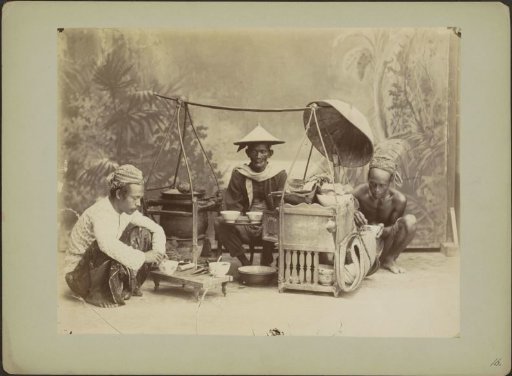 Three Indonesian men with kitchen utensils