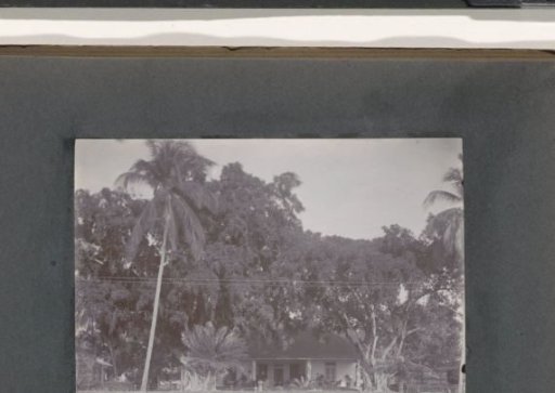House with a veranda under trees, probably on the grounds of a hospital in the Dutch East Indies
