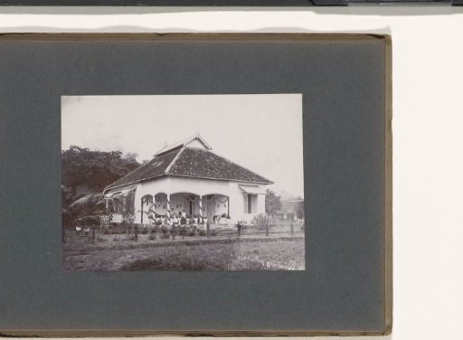 Two Women Posing on the Veranda of a Residence, Probably on the Grounds of a Hospital in the Dutch East Indies
