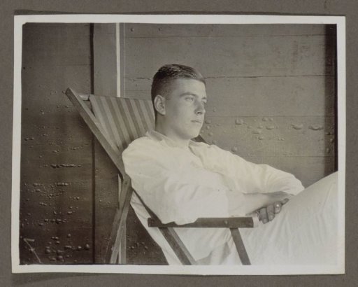 Man seated in a deck chair