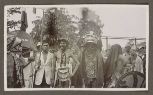 Costumed and painted participants in a parade