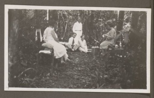 Group of men and women in a forest