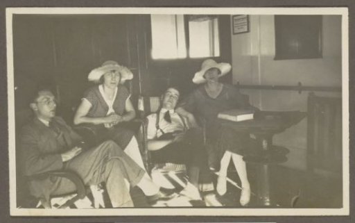 Two men and two women on board a ship