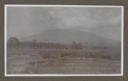 Landscape with a volcano, the top in the clouds