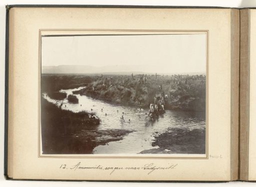 Oxen pulling an ammunition wagon over the Klip River in South Africa