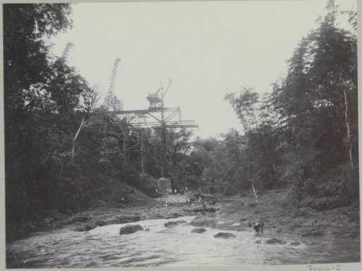 Construction of the central section of a bridge on the eastern bank of the Kali Brantas south of Malang (Photo XV)