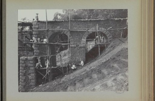Masonry work on completed abutment on the western bank of the Kali Brantas south of Malang (Photo XX)