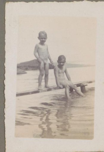 Georges and Hans Bergsma by a body of water in Sumatra, naked