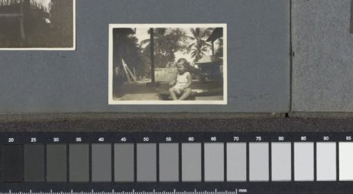 Child in garden, presumably a child of the Bergsma family in Sumatra