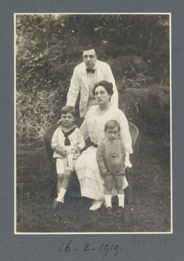 Group portrait of Eiso and Gerda Bergsma with their children Georges and Hans in a garden on Sumatra