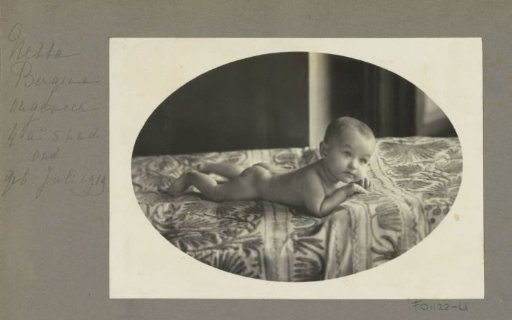 Netta Bergsma as a baby, naked on a mat in Sumatra