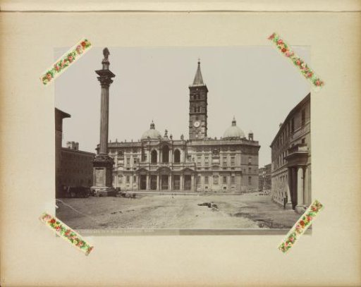 Exterior of the Basilica of Santa Maria Maggiore with a statue of Mary on a pillar to the left