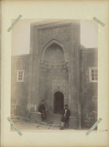 Entrance of a mosque decorated with reliefs, possibly in Baku