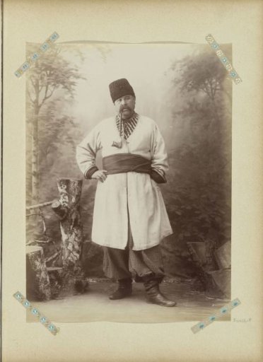 Portrait of an unknown Russian man with fur cap and pipe