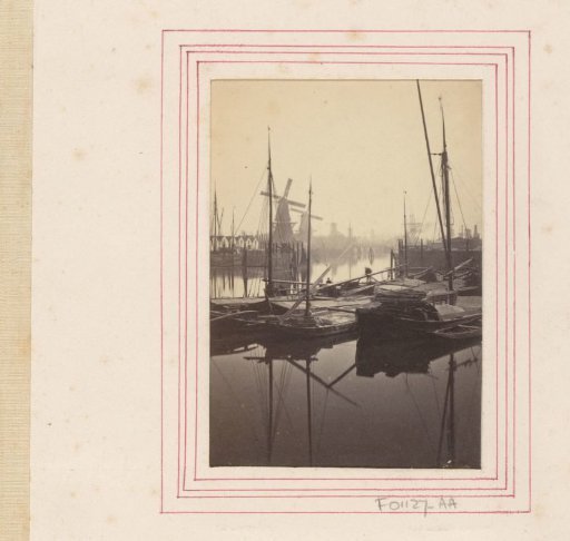 View of a harbour with windmills in Rotterdam, probably the Boerengat