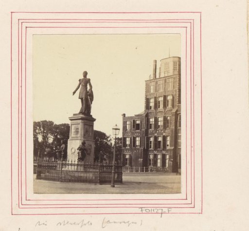 Statue of King William II at the Buitenhof with the observatory to the right