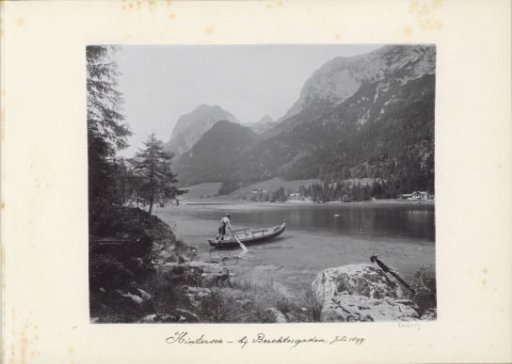 Man in a rowing boat on the Hintersee near Berchtesgaden